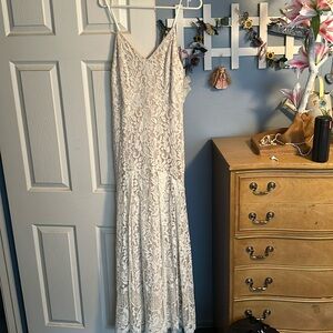 Lulu’s brand white lace detailed dress. Size: medium